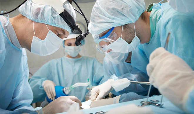 surgeons performing procedure